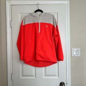 Under Armour Half Zip. Hot pink orange color